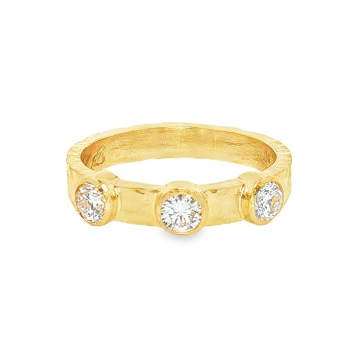 19K yellow gold diamond band set with 3 round diamonds (0.50CTW) from ELIZABETH LOCKE.