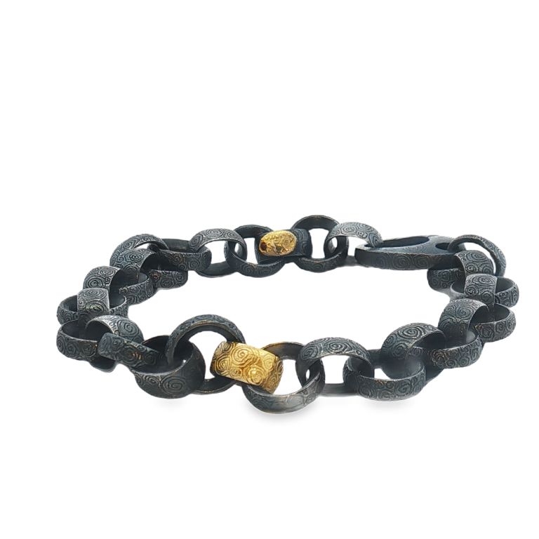 18K Yellow Gold Sterling Silver Oxidized Link Bracelet with One Silver Colored Link Set with One Round Ruby on the Hallmark