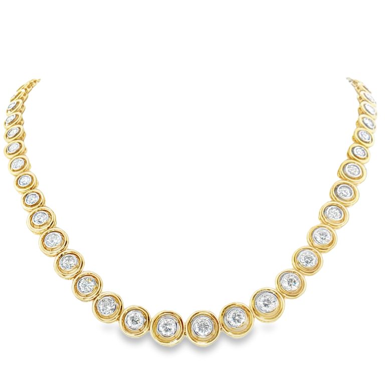 18k yellow and white gold diamodn necklace set with 56 diamonds weighing approximately 9.00cts