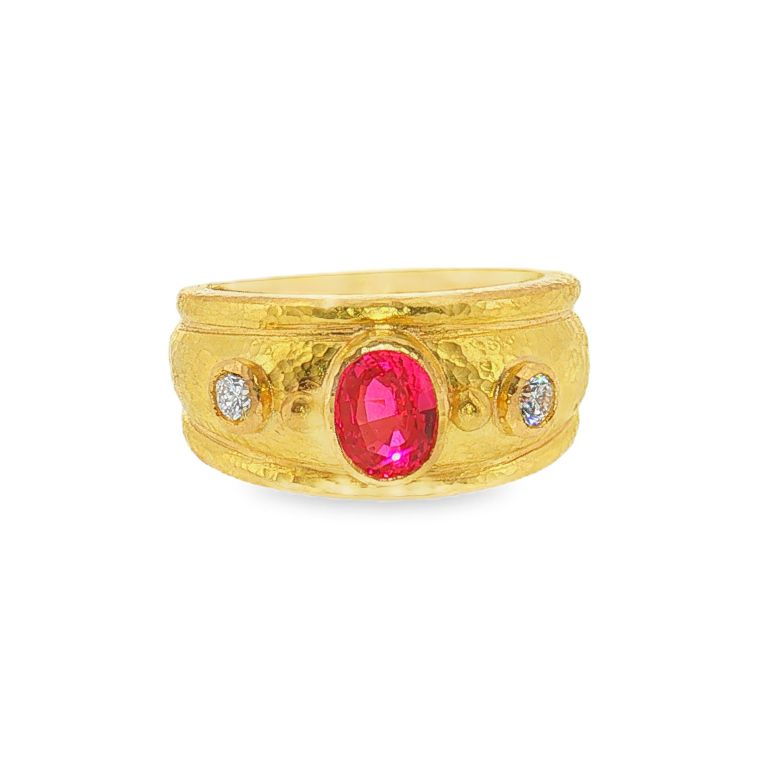 19k Yellow gold pink spinel ring with one oval pink spinel and two round diamonds