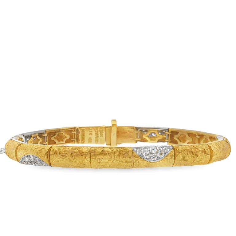Platinum 22k and 18k yellow gold diamond bracelet set with 45 Round diamonds (0.95ctw)(FG/VS)