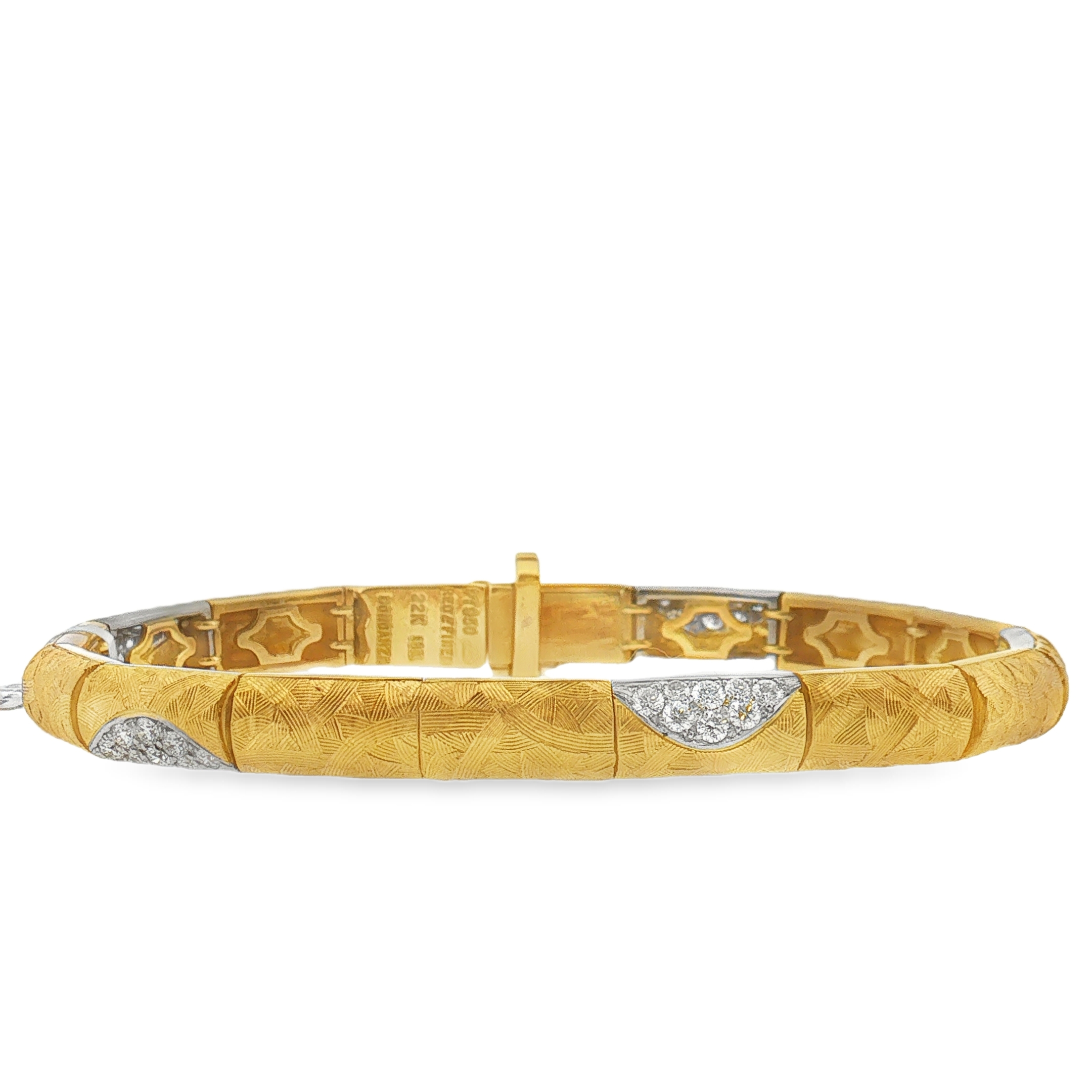 Platinum 22k and 18k yellow gold diamond bracelet set with 45 Round diamonds (0.95ctw)(FG/VS)