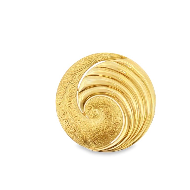 18k yellow gold swirl pin by designer Stephen Webster.