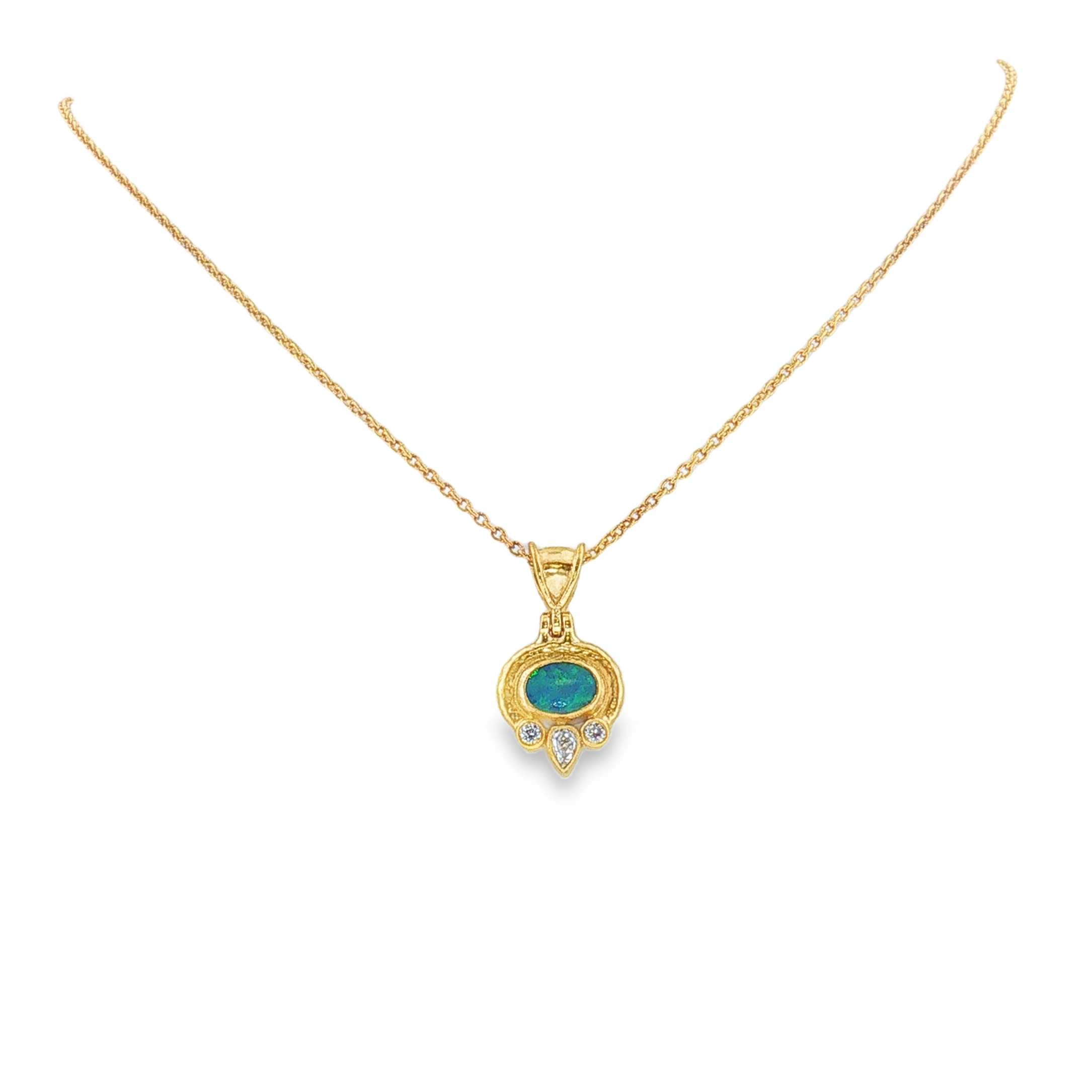 24k yellow gold opal and diamond necklace set with 1 oval shaped opal (.70ct) and 1 pear shaped diamond (.10ct) and 2 round cut diamonds (.10ctw).