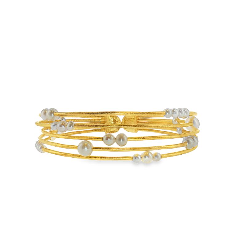 Gurhan 24k yellow gold pearl cuff with 32 pearls.