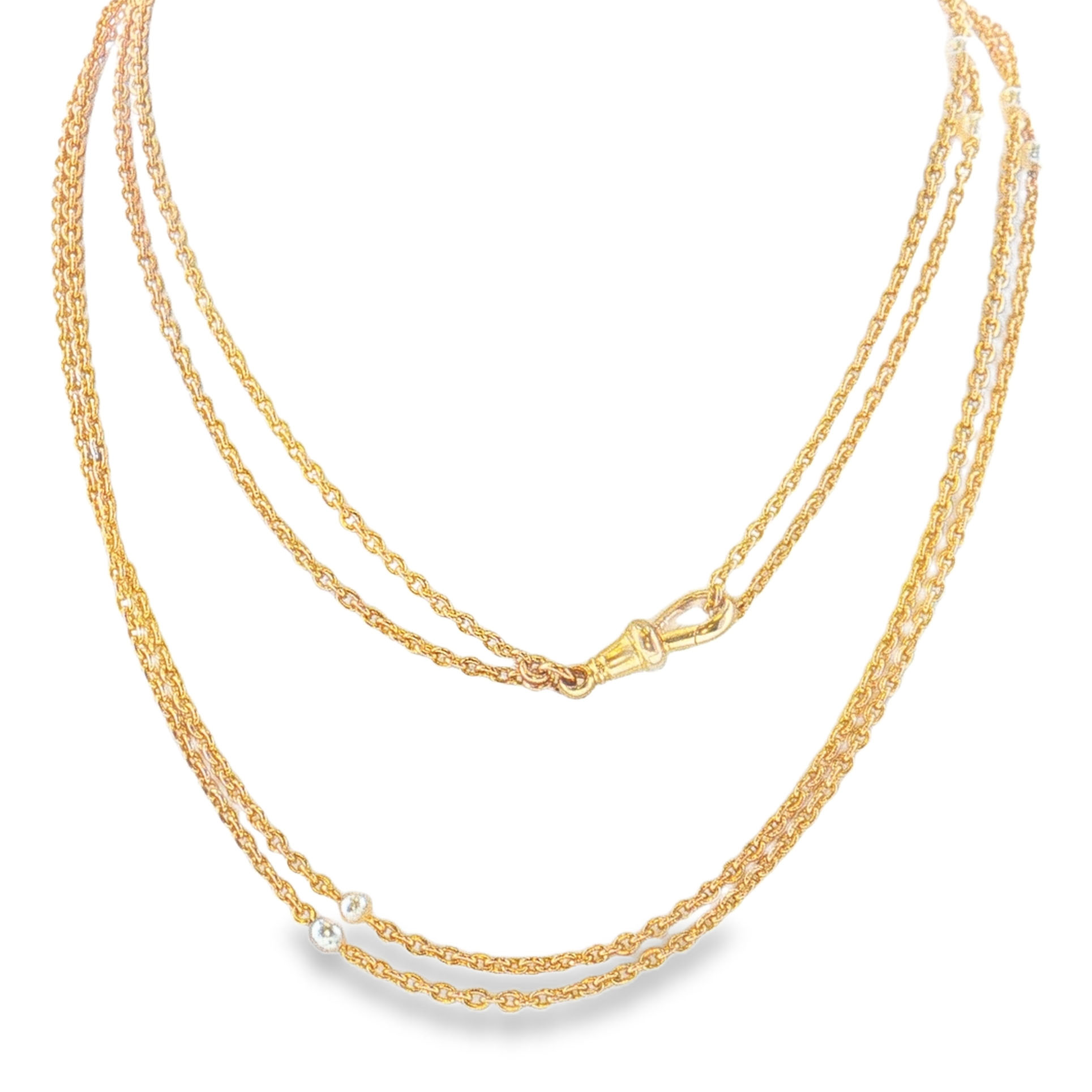 16k yellow gold pocket watch chain with 10 pearl stations with a length of 57 inches.