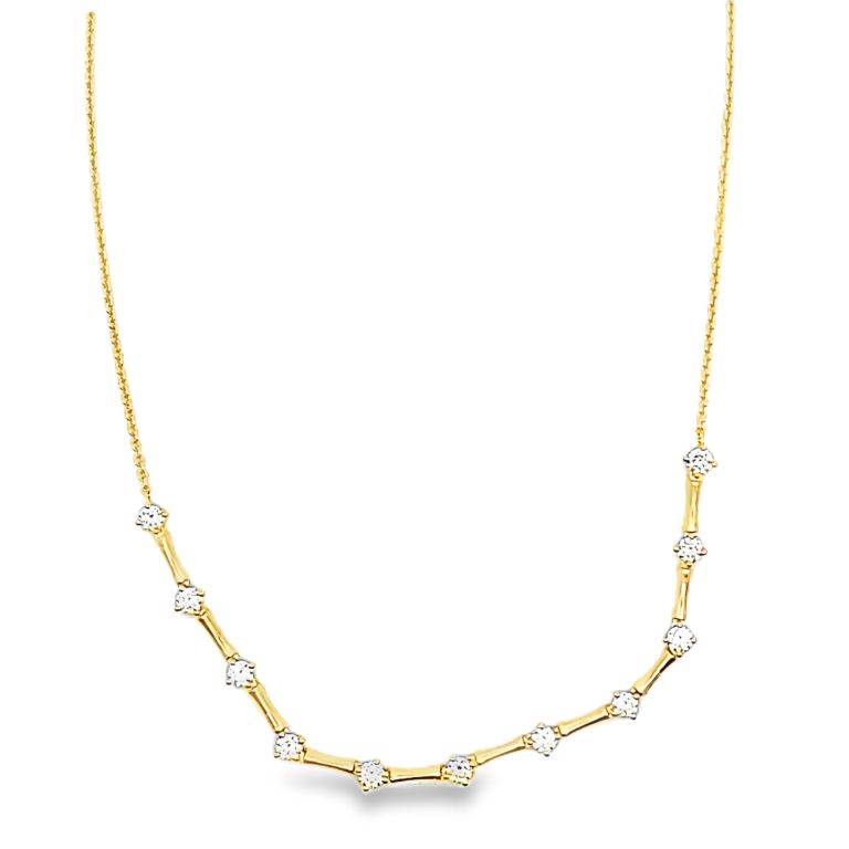 18k yellow gold diamond station necklace set with 199 round diamonds (2.93ctw) with a length of 16 inches.