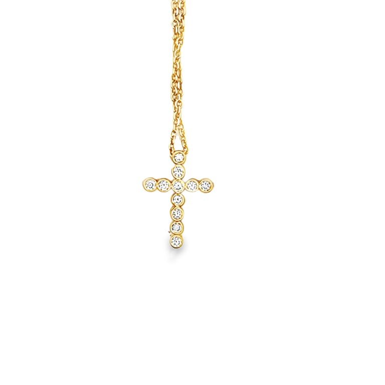 18k yellow gold diamond cross necklace set with 11 round diamonds (FG/VS) (.16ctw) with a length of 18 inches.