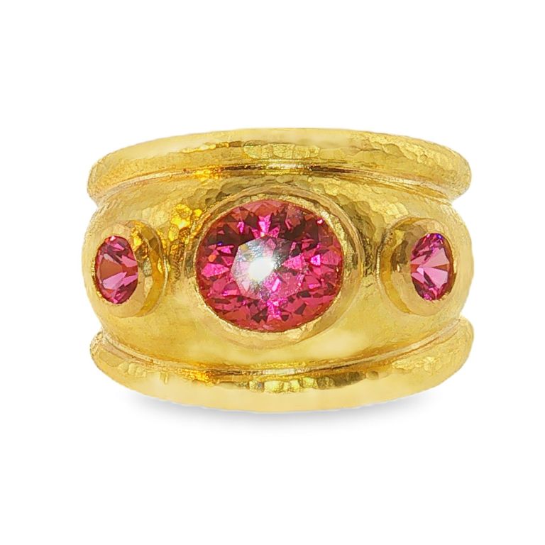 19k yellow gold ring by Elizabeth Locke set with three oval pink spinels.